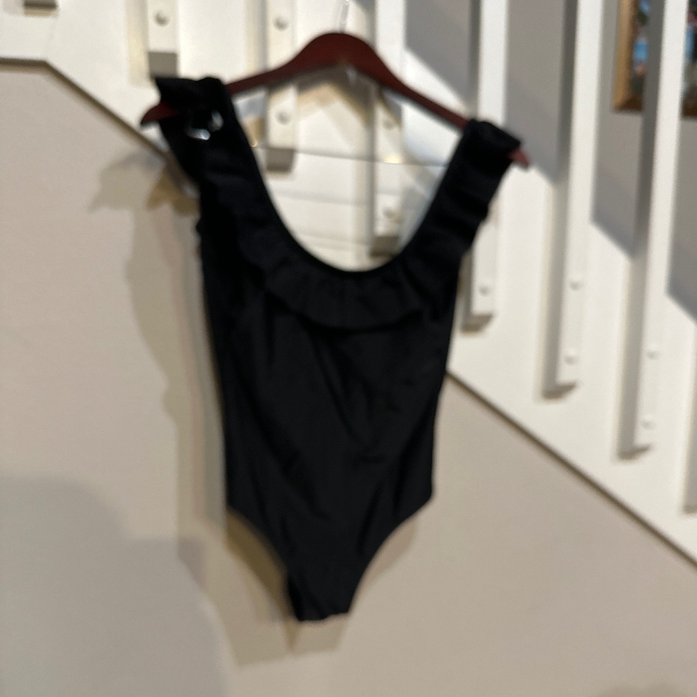 Black swimsuit by Sugar coast
